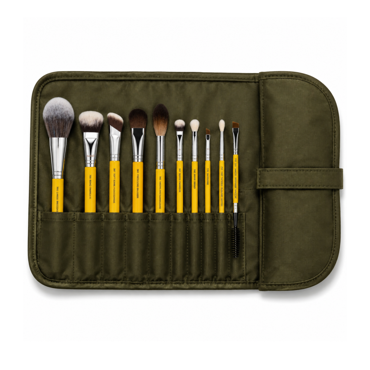 Estuche enrollable profesional abierto mostrando la organización interna de las brochas Bdellium Tools.