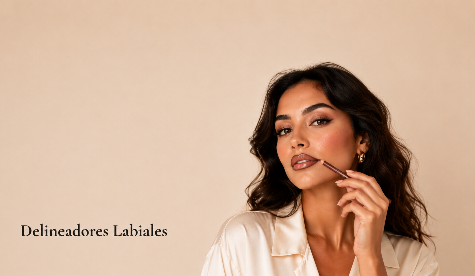 Woman applying lip liner with a pencil on a beige background