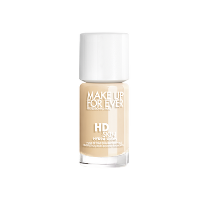 Empaque exterior de la base líquida de alta definición HD Skin Hydra Glow de Make Up For Ever con el logotipo oficial de la marca profesional.