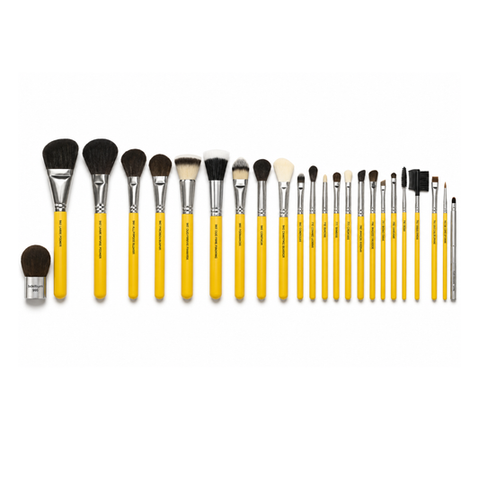 Manta enrollable Roll-Up Pouch de cuero sintético abierta mostrando el juego completo de 24 brochas de maquillaje premium Bdellium Tools.