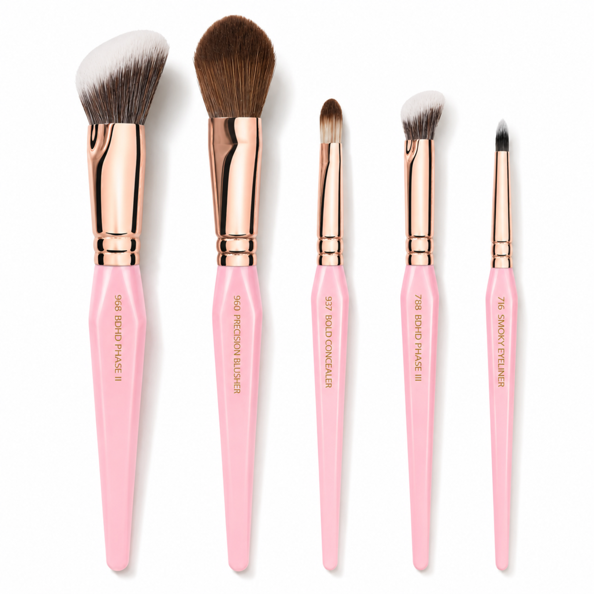 Primer plano de la colección completa, resaltando la variedad de cabezales para rostro y ojos con el distintivo diseño rosa.