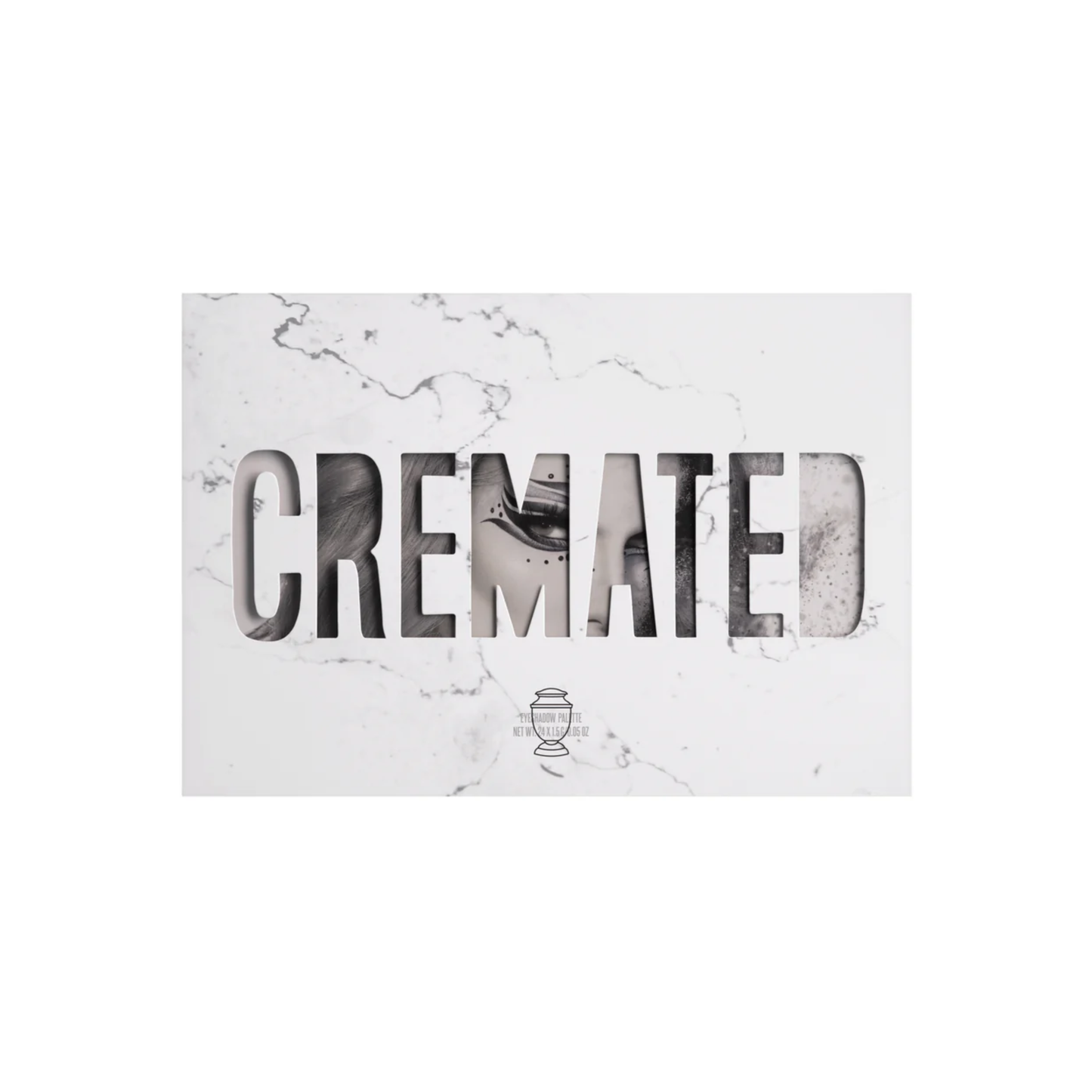 Diseño exterior del empaque original de la paleta de sombras Cremated Palette con estética de mármol