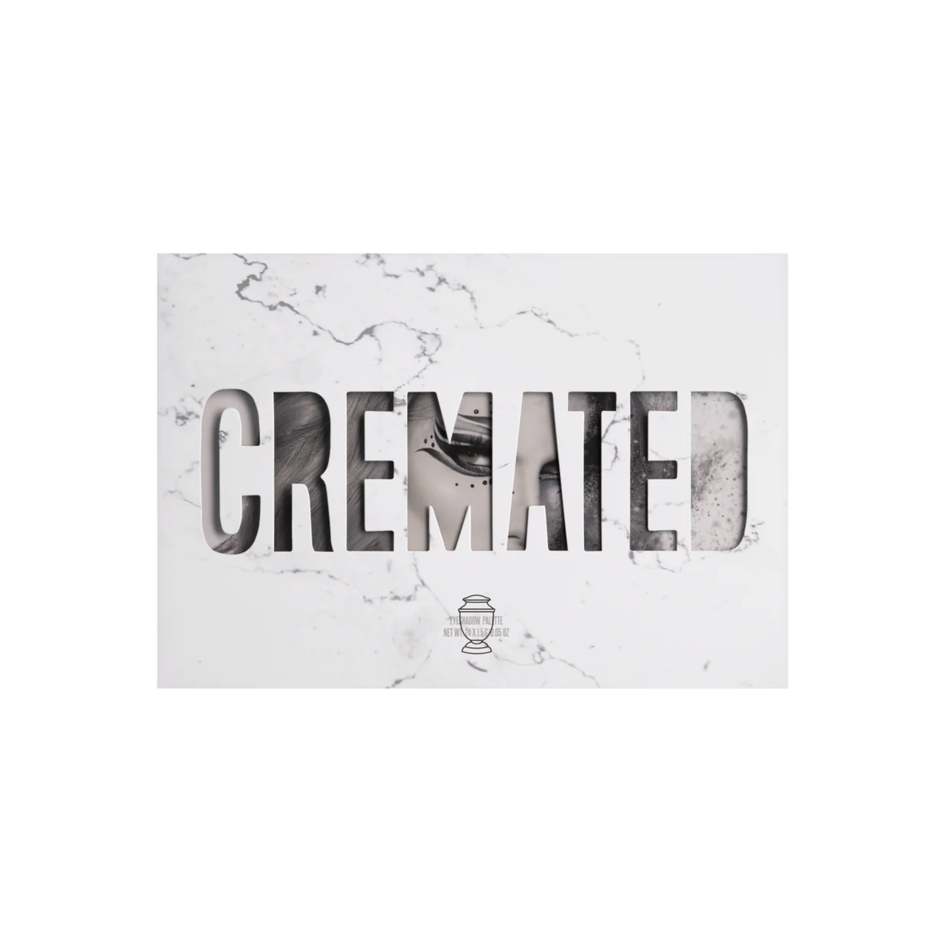 Diseño exterior del empaque original de la paleta de sombras Cremated Palette con estética de mármol