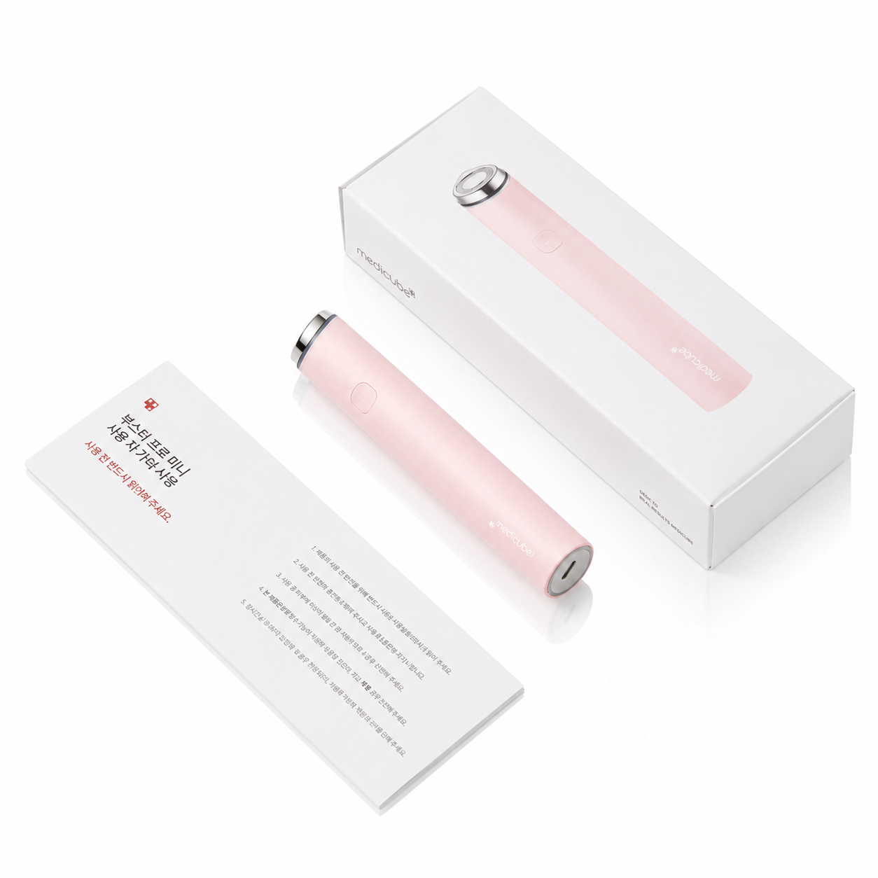 Detalle del diseño y los controles del Age-R Booster Pro Mini Plus Pink de Medicube.