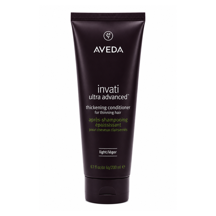 Invati Ultra Advanced Thickening Conditioner Light de Aveda en su envase.