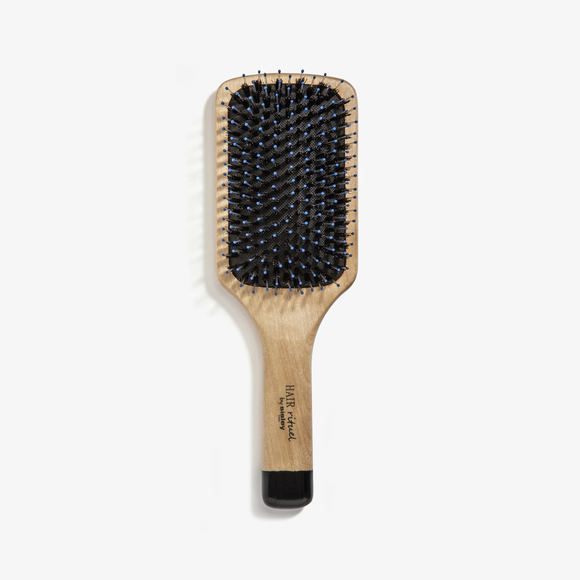 Cepillo plano de madera Hair Rituel La Brosse de la marca Sisley Paris.