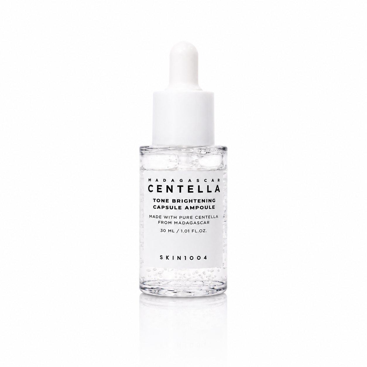 Envase de ampolleta facial Tone Brightening Capsule Ampoule de la marca SKIN1004.